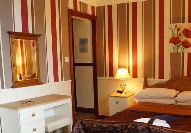 Imagen de la habitación del Hotel The Boathouse, Holyhead. Foto 18