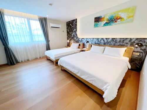 Imagen de la habitación del Hotel The Borneo. Foto 15