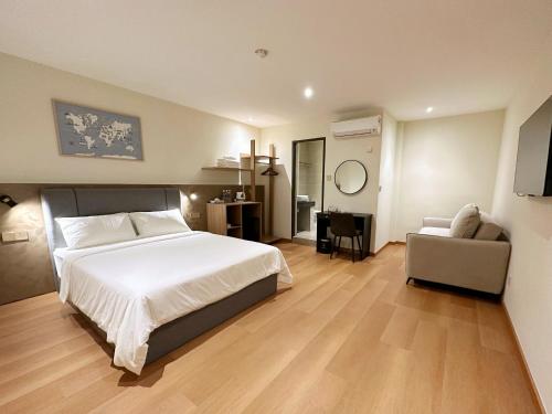 Imagen de la habitación del Hotel The Borneo. Foto 18