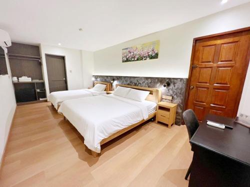 Imagen de la habitación del Hotel The Borneo. Foto 19