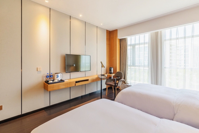 Imagen de la habitación del Hotel The Borrman Kunming Kmg. Foto 10