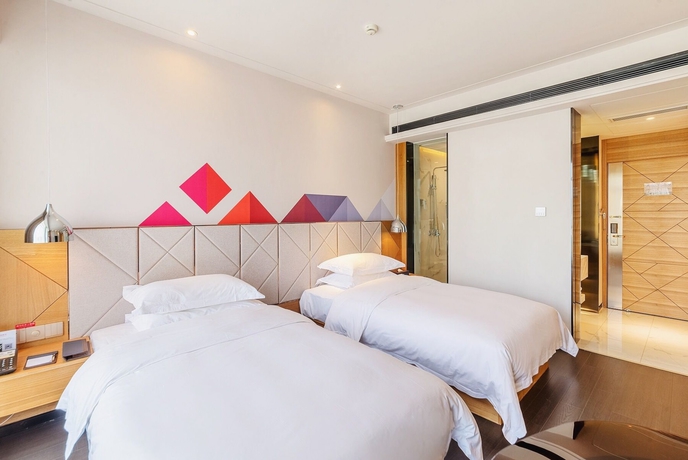 Imagen de la habitación del Hotel The Borrman Kunming Kmg. Foto 11