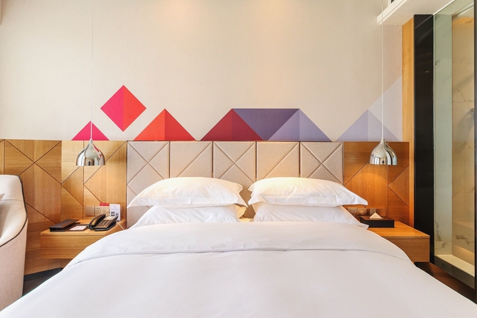 Imagen de la habitación del Hotel The Borrman Kunming Kmg. Foto 14