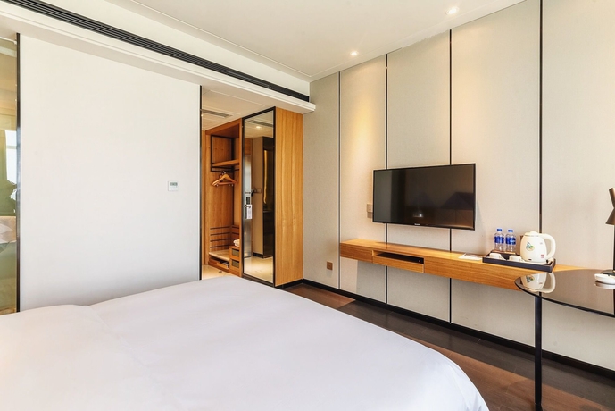 Imagen de la habitación del Hotel The Borrman Kunming Kmg. Foto 15