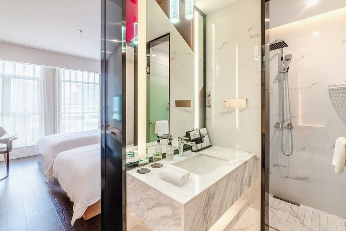Imagen de la habitación del Hotel The Borrman Kunming Kmg. Foto 16
