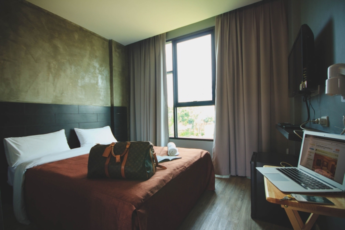 Imagen de la habitación del Hotel The Botanic Service Room. Foto 9