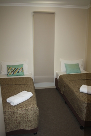 Imagen de la habitación del Hotel The Bowlo Holiday Cabins. Foto 7