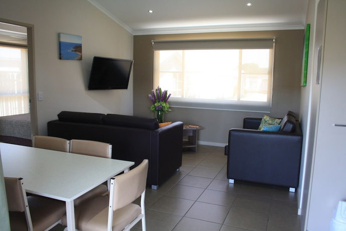 Imagen de la habitación del Hotel The Bowlo Holiday Cabins. Foto 9