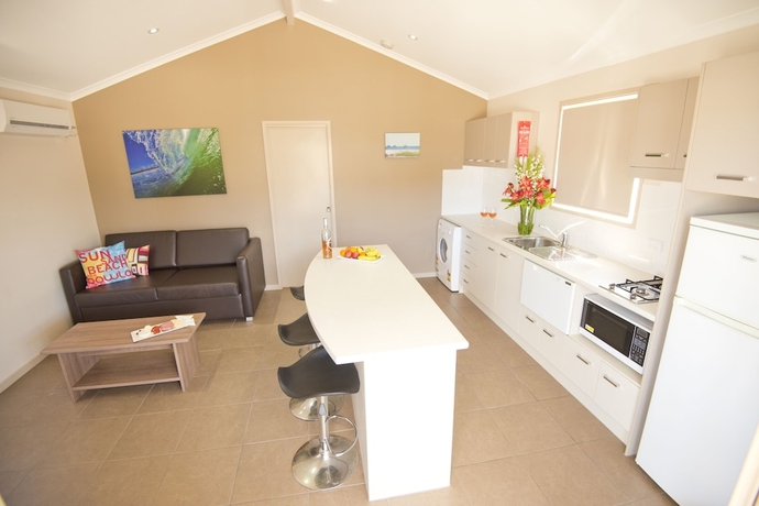 Imagen de la habitación del Hotel The Bowlo Holiday Cabins. Foto 12