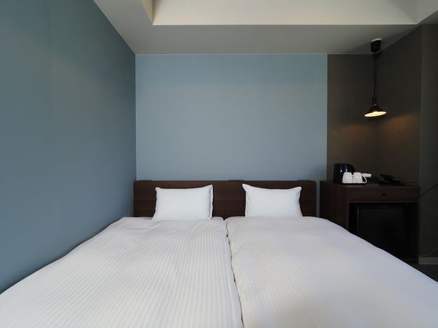 Imagen de la habitación del Hotel The Box Kyoto. Foto 14