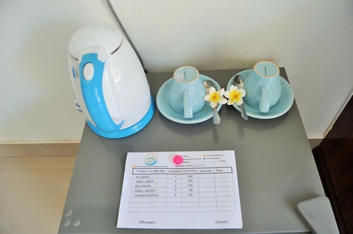 Imagen de la habitación del Hotel The Box Paradise Bungalow. Foto 2