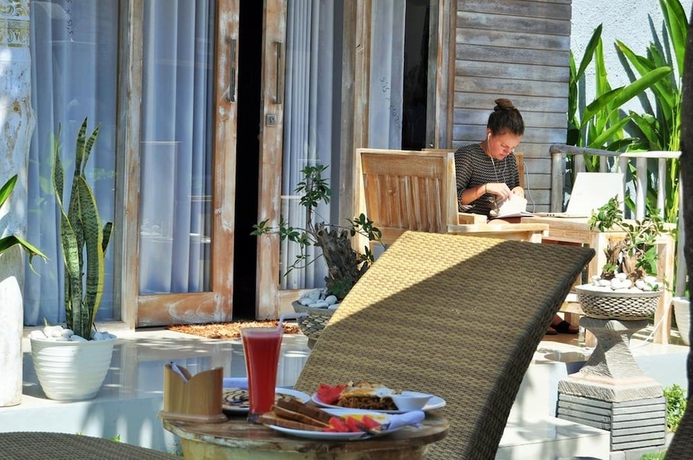 Imagen de la habitación del Hotel The Box Paradise Bungalow. Foto 7