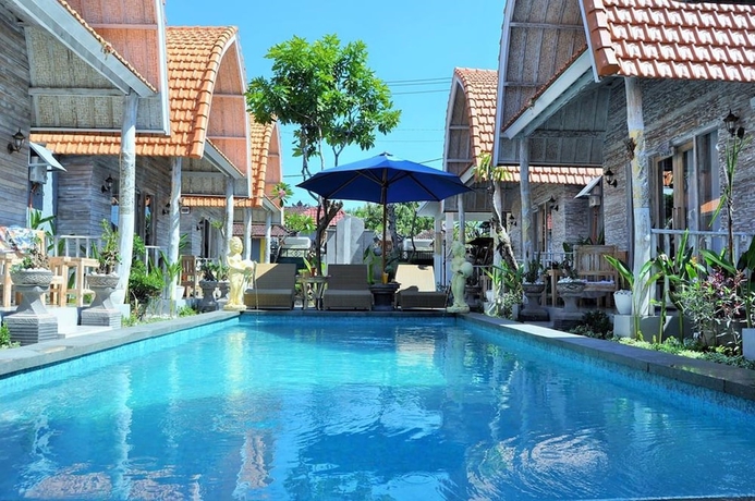 Imagen de la piscina del Hotel The Box Paradise Bungalow. Foto 15
