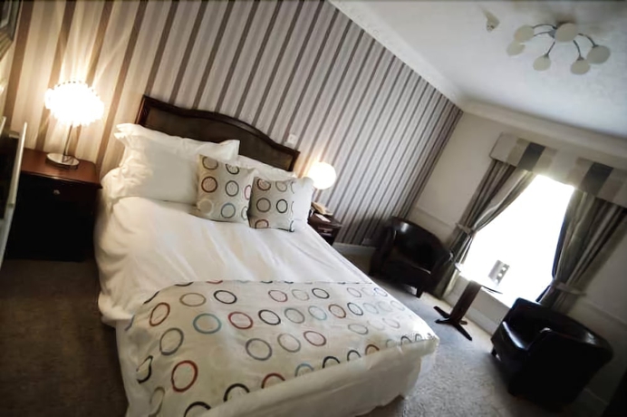Imagen de la habitación del Hotel The Brackenborough. Foto 13