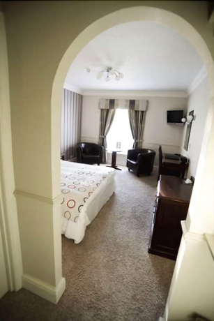 Imagen de la habitación del Hotel The Brackenborough. Foto 14