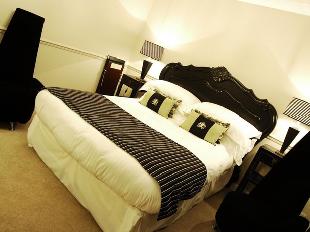 Imagen de la habitación del Hotel The Brackenborough. Foto 16