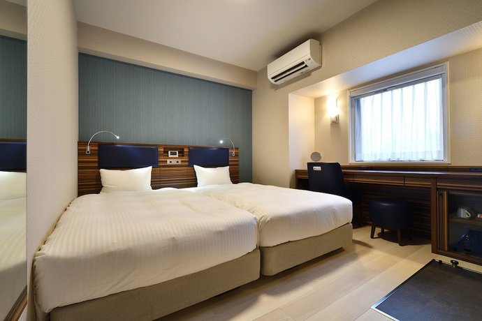 Imagen de la habitación del Hotel The Breakfast Fukuoka Nakasu. Foto 10