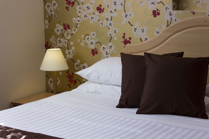 Imagen de la habitación del Hotel The Brent. Foto 4