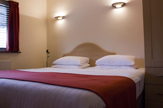 Imagen de la habitación del Hotel The Brent. Foto 5