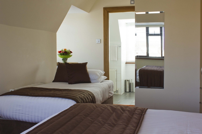 Imagen de la habitación del Hotel The Brent. Foto 6