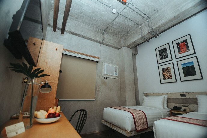 Imagen de la habitación del Hotel The Bricks. Foto 14