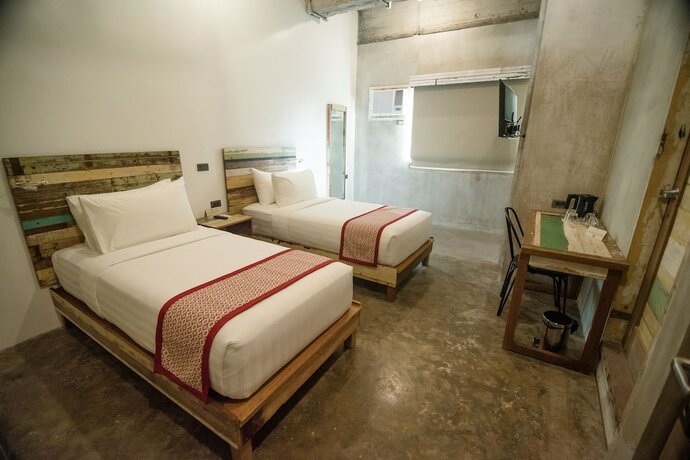 Imagen de la habitación del Hotel The Bricks. Foto 19