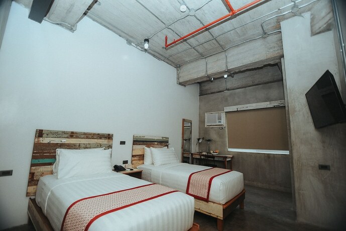 Imagen de la habitación del Hotel The Bricks. Foto 20