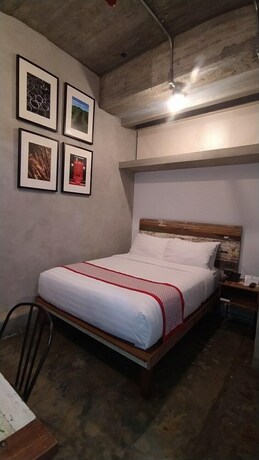 Imagen de la habitación del Hotel The Bricks. Foto 22