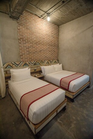 Imagen de la habitación del Hotel The Bricks. Foto 23
