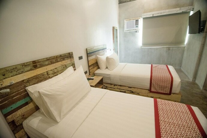 Imagen de la habitación del Hotel The Bricks. Foto 29