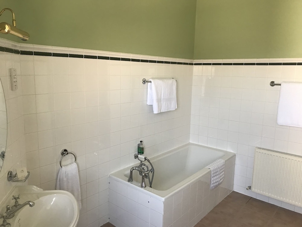 Imagen de la habitación del Hotel The Bridge Guest House. Foto 11