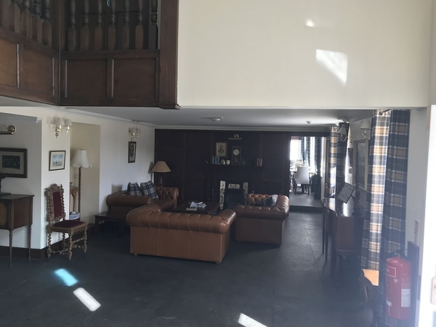 Imagen del bar/restaurante del Hotel The Bridge Guest House. Foto 2
