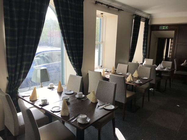 Imagen del bar/restaurante del Hotel The Bridge Guest House. Foto 4
