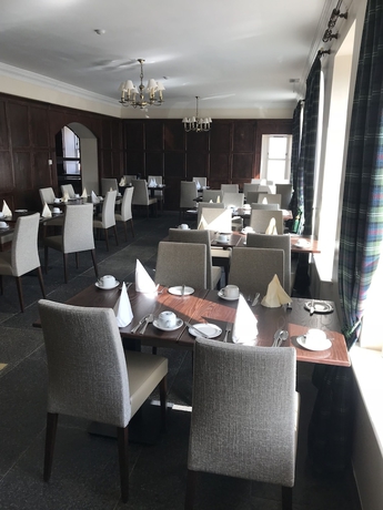 Imagen del bar/restaurante del Hotel The Bridge Guest House. Foto 5