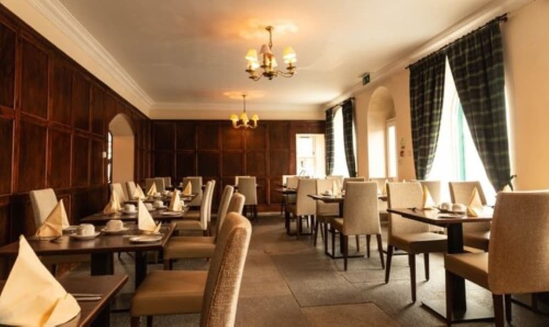 Imagen del bar/restaurante del Hotel The Bridge Guest House. Foto 6