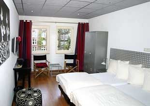 Imagen de la habitación del Hotel The Bridge Hotel. Foto 8