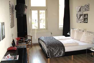 Imagen de la habitación del Hotel The Bridge Hotel. Foto 9
