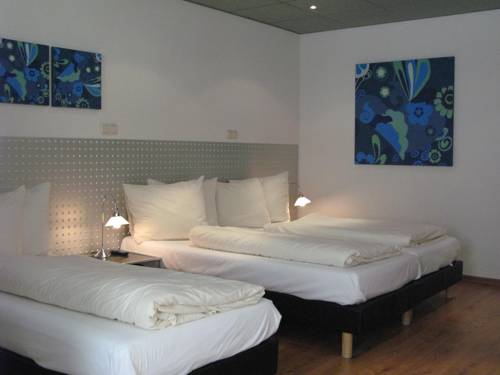 Imagen de la habitación del Hotel The Bridge Hotel. Foto 12