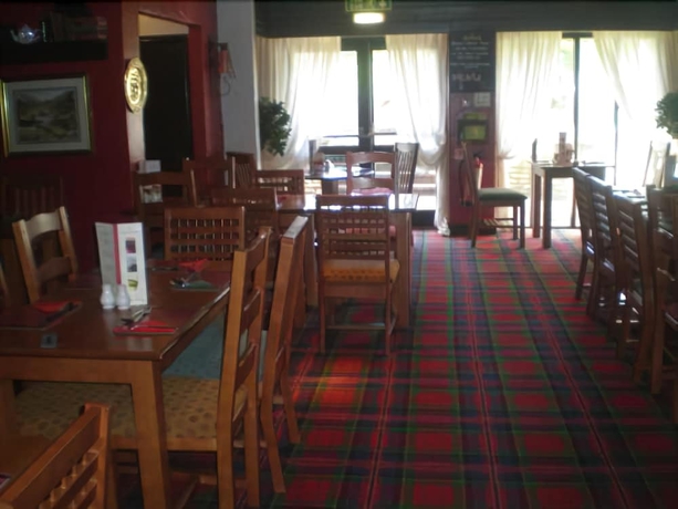 Imagen del bar/restaurante del Hotel The Bridge Inn, Holmrook. Foto 3