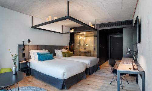 Imagen de la habitación del Hotel The Bridge Wroclaw - MGallery. Foto 14