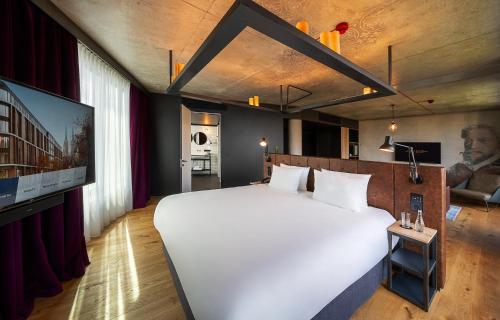 Imagen de la habitación del Hotel The Bridge Wroclaw - MGallery. Foto 15