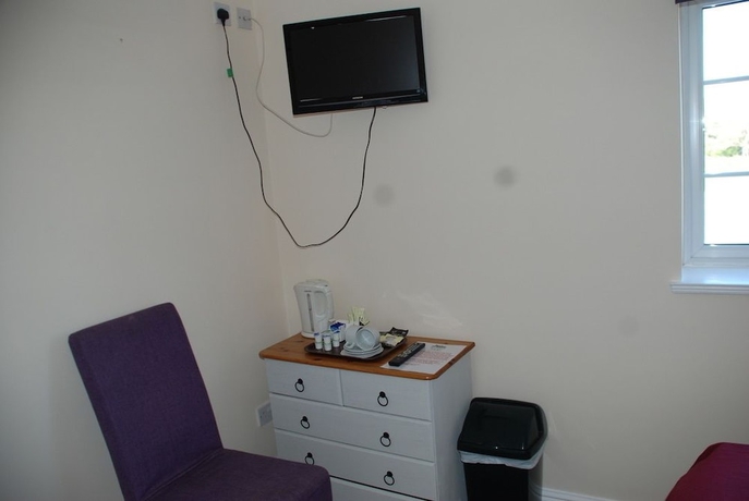 Imagen de la habitación del Hotel The Bridgehouse. Foto 10