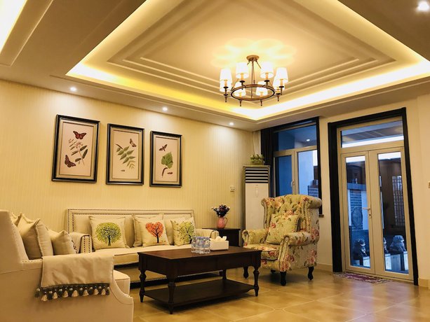 Imagen de la habitación del Hotel The Brigh Eco Hotel Yantai. Foto 2