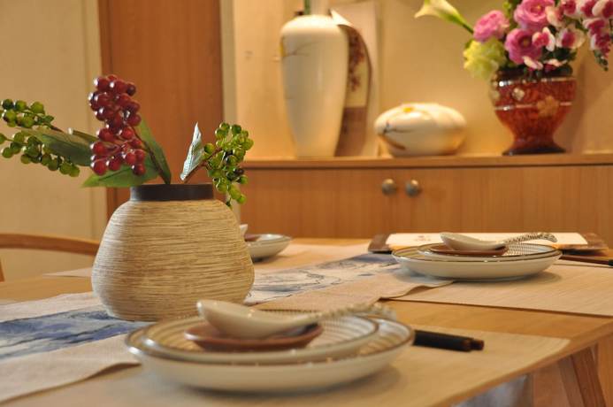 Imagen de la habitación del Hotel The Brigh Eco Hotel Yantai. Foto 4
