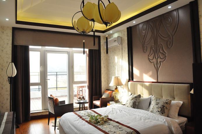 Imagen de la habitación del Hotel The Brigh Eco Hotel Yantai. Foto 7