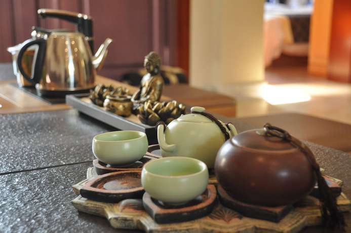 Imagen de la habitación del Hotel The Brigh Eco Hotel Yantai. Foto 8