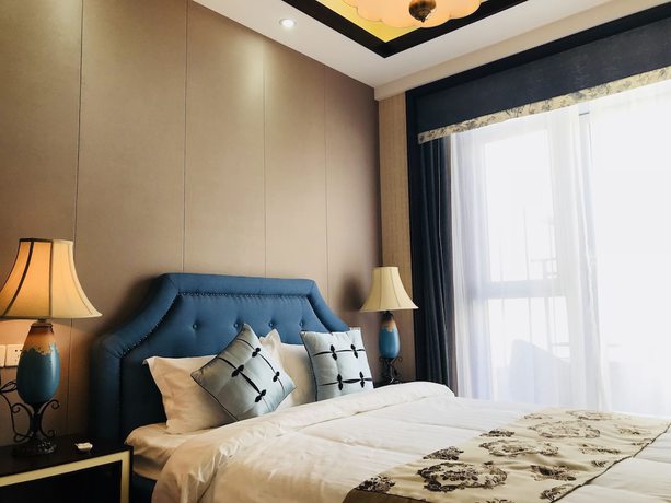Imagen de la habitación del Hotel The Brigh Eco Hotel Yantai. Foto 15