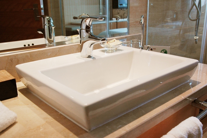 Imagen de la habitación del Hotel The Brigh Radiance Weihai. Foto 5