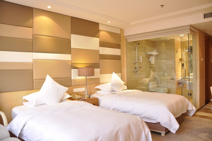 Imagen de la habitación del Hotel The Brigh Radiance Weihai. Foto 7