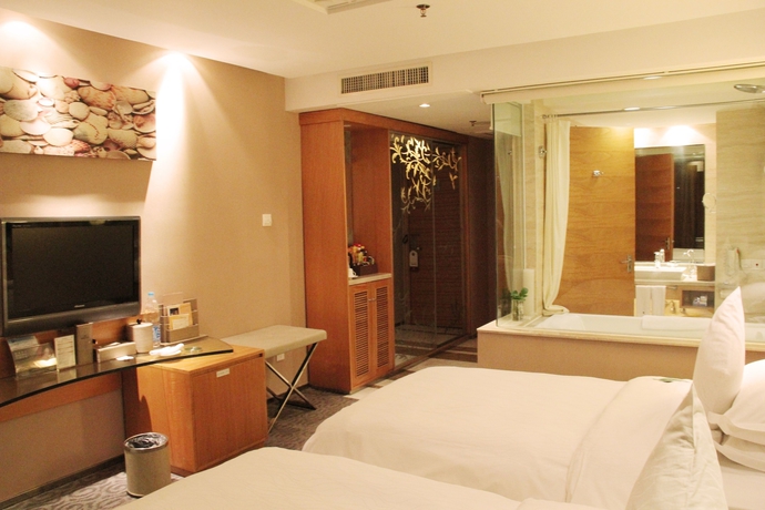 Imagen de la habitación del Hotel The Brigh Radiance Weihai. Foto 9